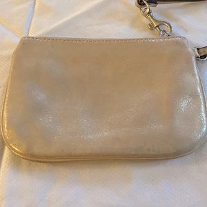 Gold coach wristlet